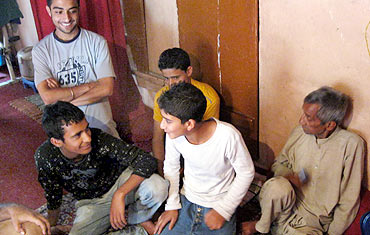Children assemble in a Srinagar home before heading out to protest