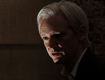 Assange speaks at a news conference at the Frontline Club in central London