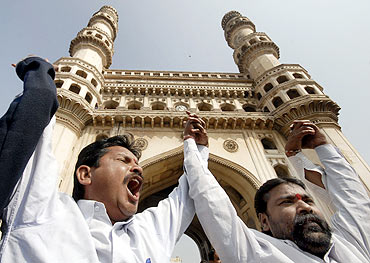 Telangana supporters demonstrate in front of Hyderabad's Charminar