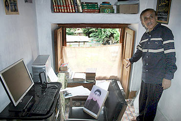 Mohammed Ashraf Mattoo in his son Tufail's study room