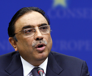 President Zardari addresses a news conference at the European Union Council in Brussels