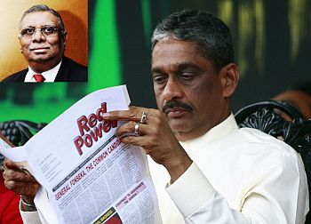 Presidential candidate Sarath Fonseka reads an article in the opposition JVP (People's Liberation Front) party's newspaper. (Inset) Razik Zarook