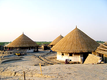 Houses rebuilt by villagers in Kutch
