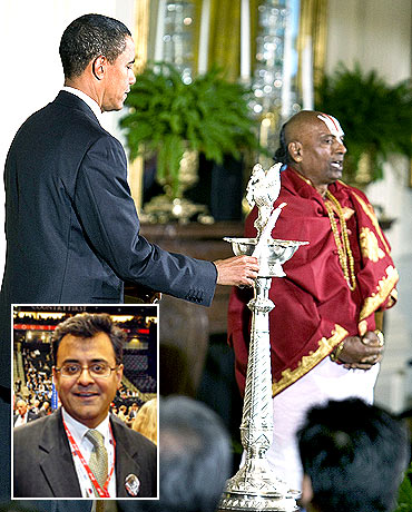 Obama lights an oil lamp to celebrate Diwali in the White House and (inset) Karan K Bhatia