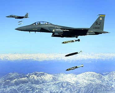 US Air Force F-15E Strike Eagle aircraft from the 335th Fighter Squadron drop 2,000-pound joint direct attack munitions on a cave in eastern Afghanistan