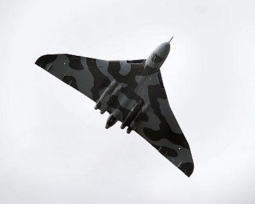 A Royal Air Force Vulcan shows its skills on the third day of the Farnborough International Airshow