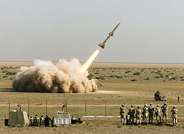 A missile is launched during a test at an unknown location in central Iran