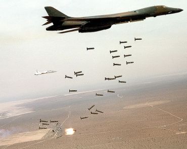 A US Air Force bomber drops cluster bombs during a training exercise