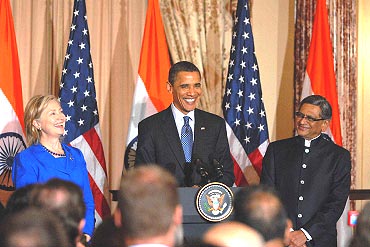 US President Barack Obama with Secretary of State Hillary Clinton and Indian External Affairs Minister S M Krishna