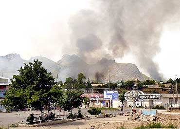 Smoke rises from the residential area of the city of Osh in Kyrgyzstan