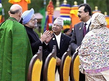 Prime Minister Manmohan Singh speaks with his Pakistani counterpart Yusuf Raza Gilani at the SAARC summit in Thimphu