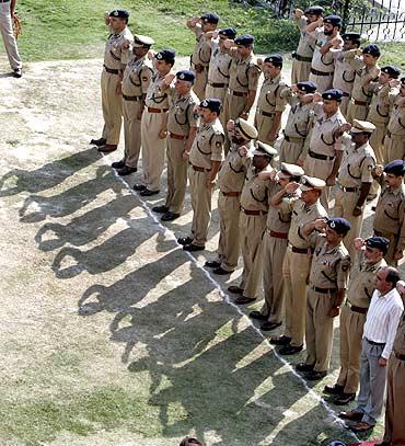 Senior Indian police officers at a wreath-laying ceremony for fallen colleagues in Srinagar, September 13, 2009.