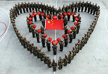 Paramilitary recruits form a heart pattern to celebrate the Chinese Lunar New Year