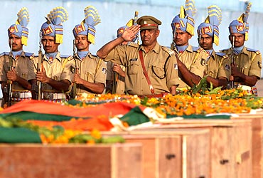 CRPF men pay their last respects to fallen colleagues massacred by Maoists in Dantewada.