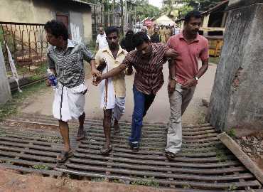 Relatives of the victims of the plane crash mourn