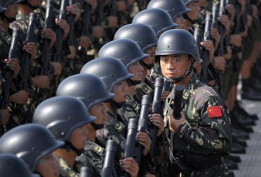 Soldiers from Chinese People's Liberation Army  special force take part in a parade