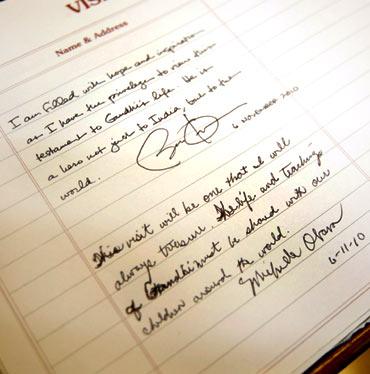 Handwritten notes by US President Barack Obama and first lady Michelle Obama are seen at the Mani Bhavan Gandhi Museum