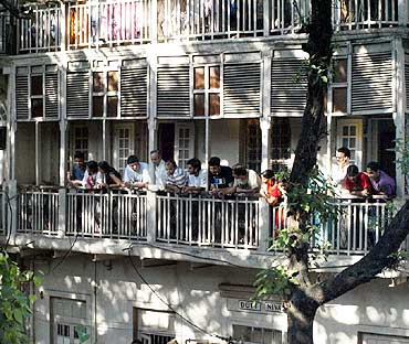 Residents around Mani Bhavan gather to catch a glimpse of the Obamas