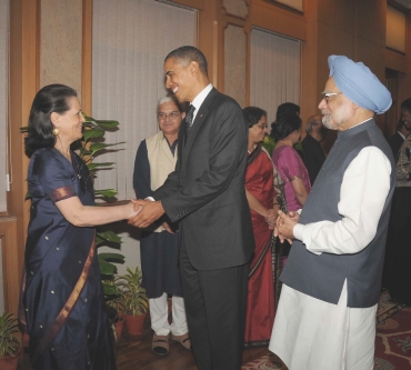 US President Barack Obama greets Congress chief Sonia Gandhi