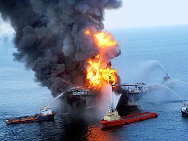 Fire boat response crews battle the blazing remnants of the offshore oil rig Deepwater Horizon, off Louisiana