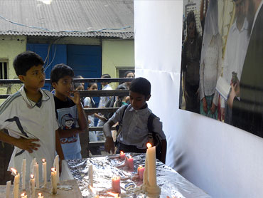 Colaba children gaze at the candles lit in memory of Gavriel and Rivka Holtzberg