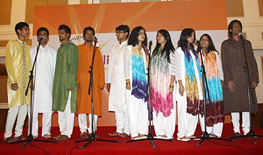 The students of St Andrew's Choir, wearing ethnic outfits, sang like angels