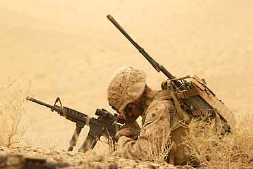 A US marine on patrol in Helmand province, Afghanistan