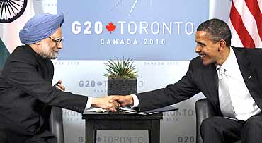 President Obama greets Prime Minister Manmohan Singh in Toronto
