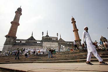 Muslims leave after Friday prayers at a mosque in Lucknow
