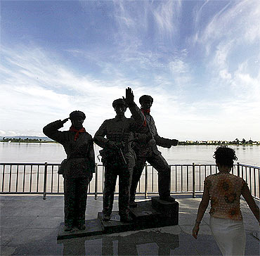 A People's Volunteer Army statue on the bank of the Yalu river