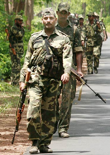 Paramilitary soldiers patrol at Jhitka near Lalgarh in the West Midnapore district, some 170 km west of Kolkata
