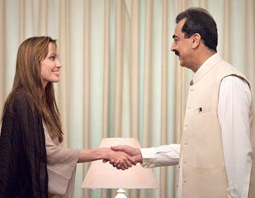 Actress Angelina Jolie with Pakistan PM Yusuf Raza Gilani
