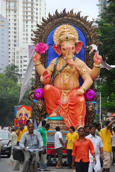 A Ganesha idol being taken in a procession
