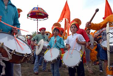 Children play the drums at the Ganeshotsav celebrations in Philadelphia