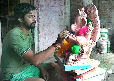 A traditional Ganpati idol at a workshop in Pen