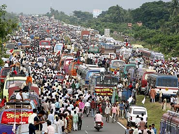 Left Front supporters block a national highway in support of the Tata car project at Singur village