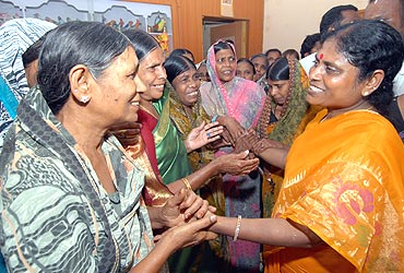 Jagan's mother Vijaylaxmi (right) with her supporters