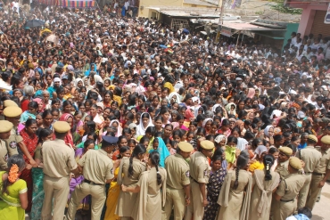 Devotees wait for a glimpse of Sai Baba