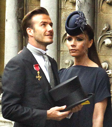 Soccer star David Beckham and his wife Victoria arrive at Westminster Abbey before the royal wedding