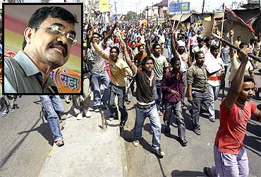 Members of the Dalit community participate in a protest rally. Inset: Anand Teltumbde