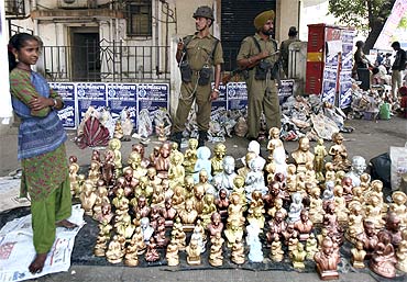 Soldiers guard statues of BR Ambedkar