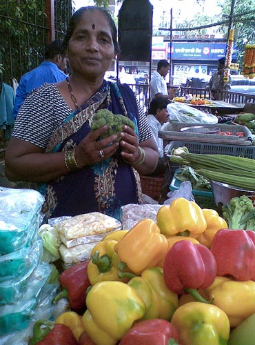 A vendor sells exotic vegetables in Mumbai