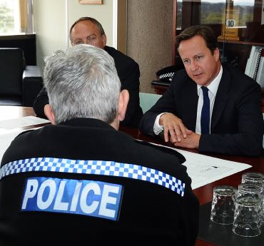 Prime Minister David Cameron meets senior officers from the police, fire and ambulance services at a meeting at Wolverhampton Civic Centre