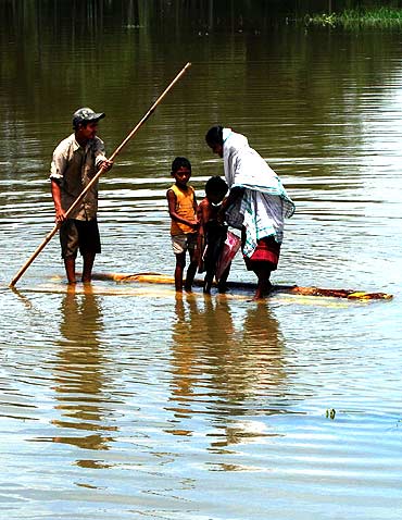 The floods claimed at least five lives in the Assam district as per bodies recovered so far, while thousands have been rendered homeless.