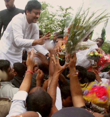 Well-wishers of K Chiranjeevi congratulate him after he was formally inducted into the Andhra Pradesh Congress