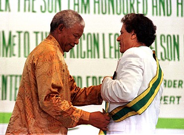 Gaddafi with former South Africa President Nelson Mandela