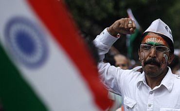 A supporter of Anna Hazare protests in Mumbai