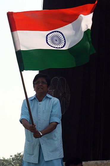 Kiran Bedi waves the tricolour at Ramlila Maidan