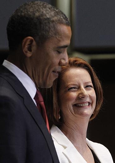 US President Barack Obama and Australian Prime Minister Julia Gillard participate in a press conference at Parliament House in Canberra, Australia