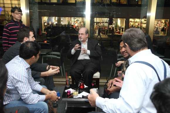 Salman Rushdie interacts with guests at Vermillion restaurant